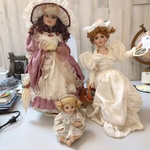 3 porcelain dolls